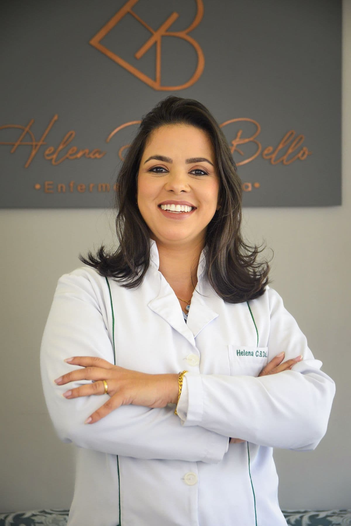 Confident female doctor in a white coat in a medical clinic